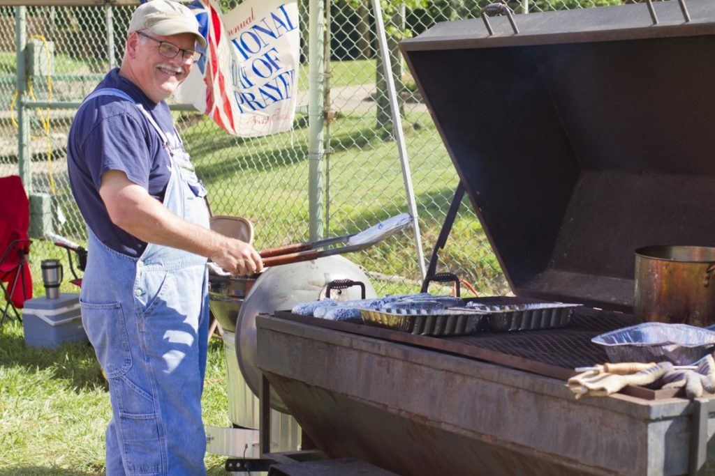 Pastor Dave Grilling Corn at SharonFest